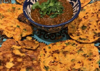 Pudlas with tomato and garlic chutney